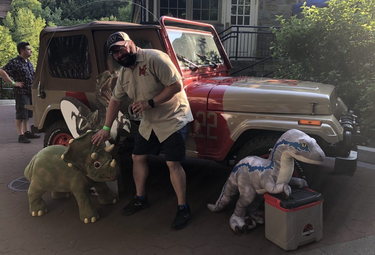 Jeff with some dino friends and a Jurassic Park Jeep